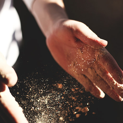 Baker with flour on hands